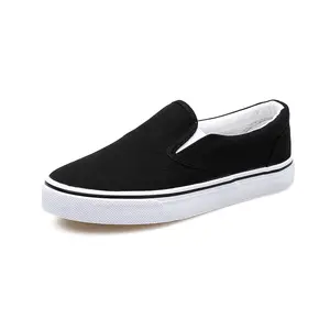 Zapatos planos vulcanizados a granel para mujer, zapatillas planas de lona, color blanco y negro, venta al por mayor